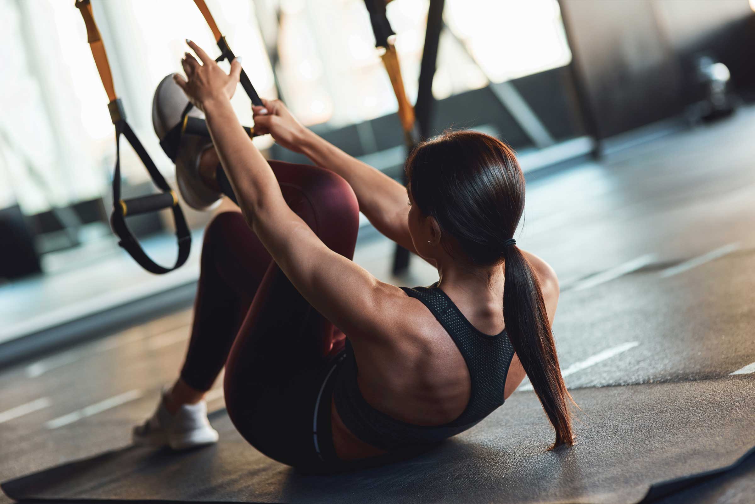 young-athletic-woman-in-sportswear-exercising-with-2021-12-09-04-17-31-utc.jpg